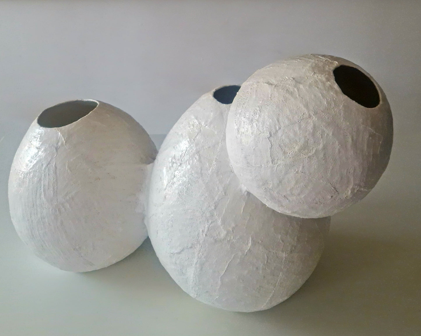 WHITE TRIPLE RAISED